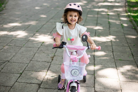 Rowerek dziecięcy 18 cali TOMABIKE z prowadnikiem - PLATINUM - CZARNY-TURKUSOWY